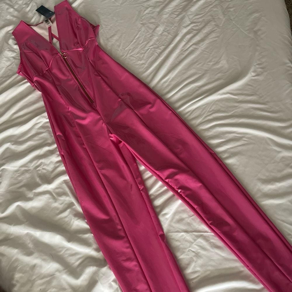 PoshByV faux leather jumpsuit. Brand New. Tag still on. SM